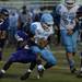 Pioneer senior safety Vada McGowan tackles Skyline sophomore quarterback Askaree Crawford on Friday. Pioneer defeated Skyline 50-0. Daniel Brenner I AnnArbor.com